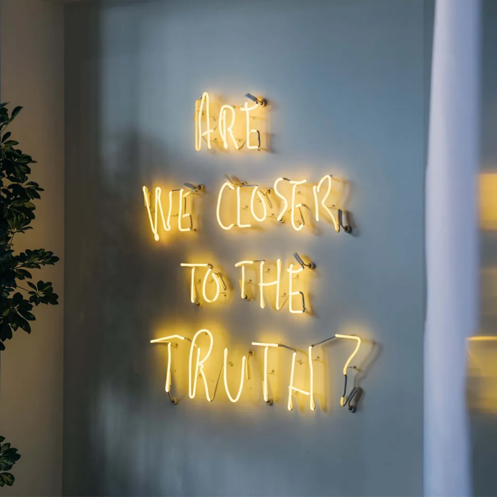 Are We Closer To The Truth? Neon sign.